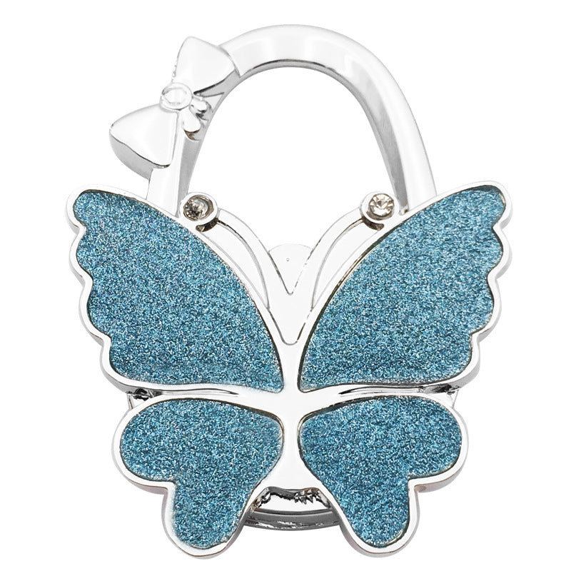 🦋Accroche-Sac Pliable Papillon – Style & Propreté en Toute Occasion ! ✨