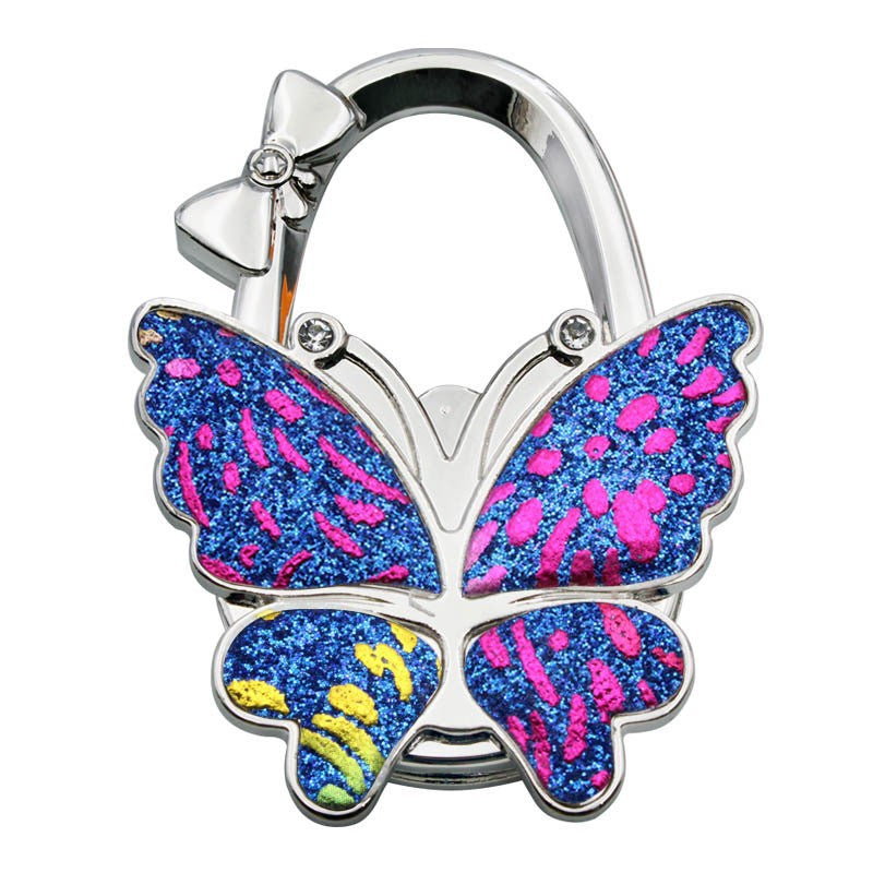🦋Accroche-Sac Pliable Papillon – Style & Propreté en Toute Occasion ! ✨