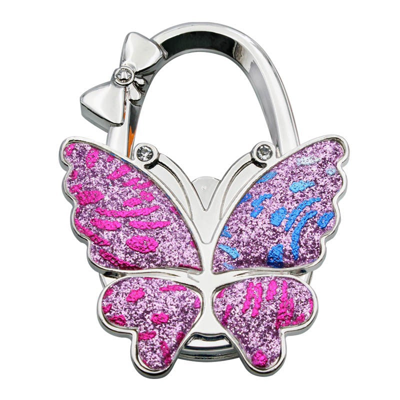 🦋Accroche-Sac Pliable Papillon – Style & Propreté en Toute Occasion ! ✨