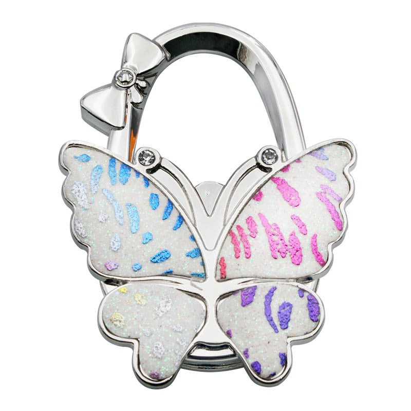 🦋Accroche-Sac Pliable Papillon – Style & Propreté en Toute Occasion ! ✨