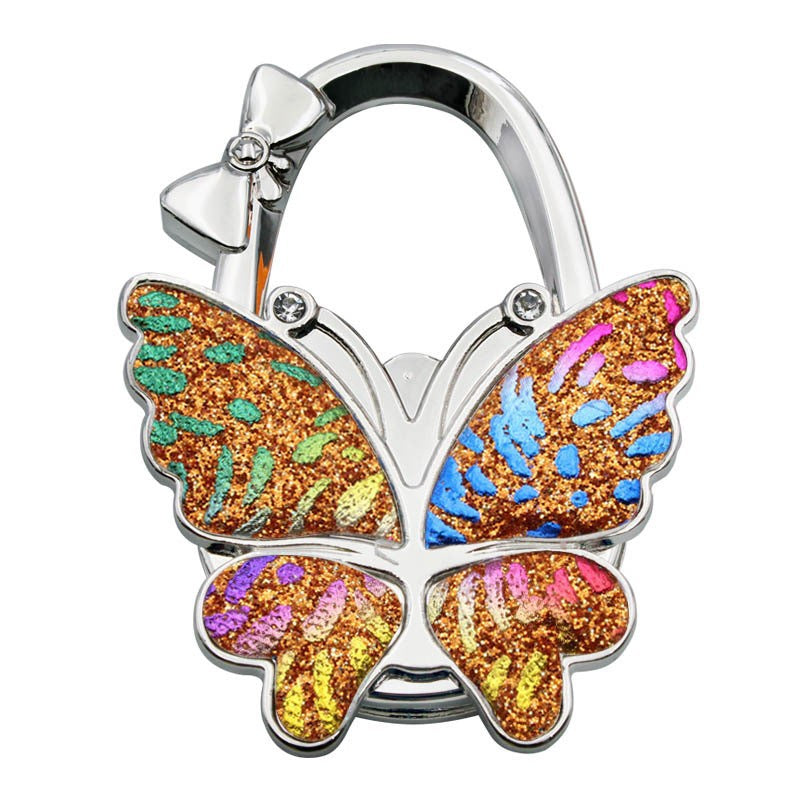 🦋Accroche-Sac Pliable Papillon – Style & Propreté en Toute Occasion ! ✨
