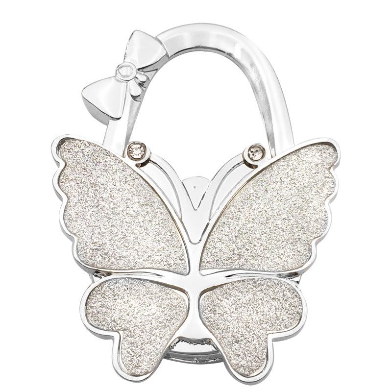 🦋Accroche-Sac Pliable Papillon – Style & Propreté en Toute Occasion ! ✨
