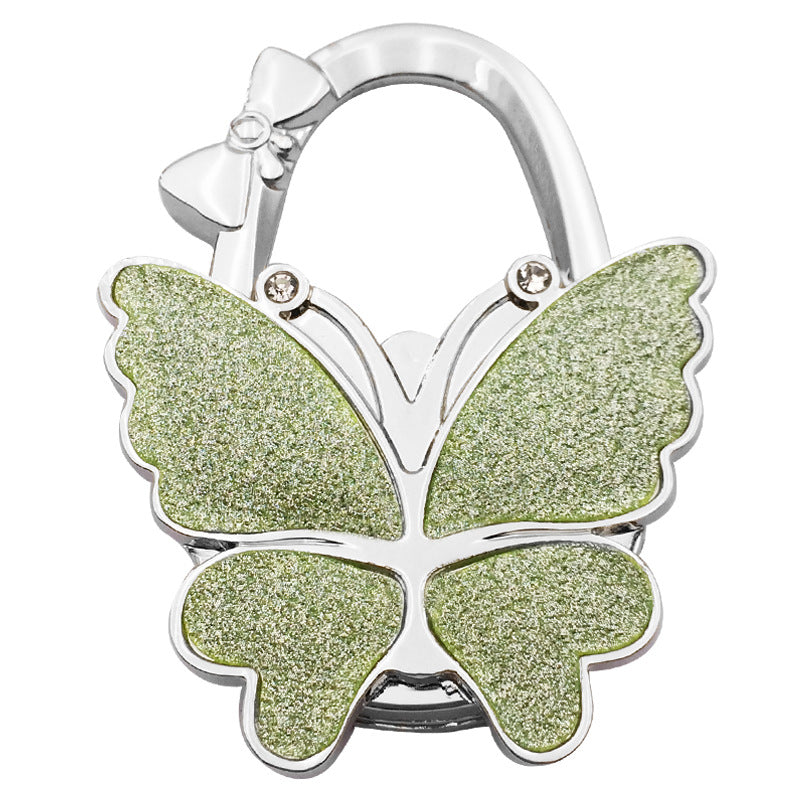 🦋Accroche-Sac Pliable Papillon – Style & Propreté en Toute Occasion ! ✨